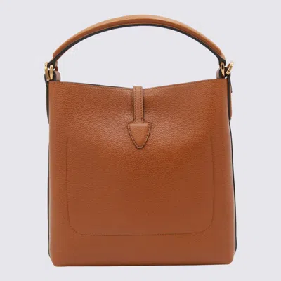 Tod's Brown Textured Leather Bucket Bag With Adjustable Strap And Gold-tone Logo In Brown