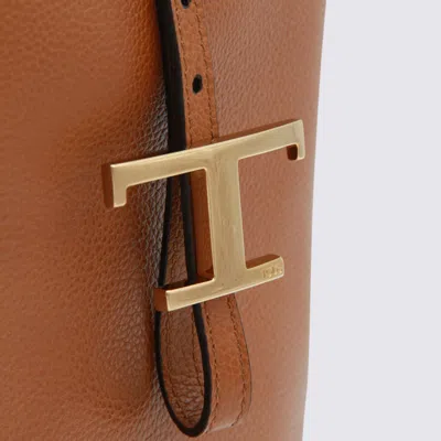Tod's Brown Textured Leather Bucket Bag With Adjustable Strap And Gold-tone Logo In Brown