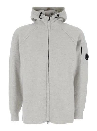 C.p. Company Grey Cardigan With Drawstring Hood And Logo Plaque On The Sleeve In Wool Blend Man In Gray
