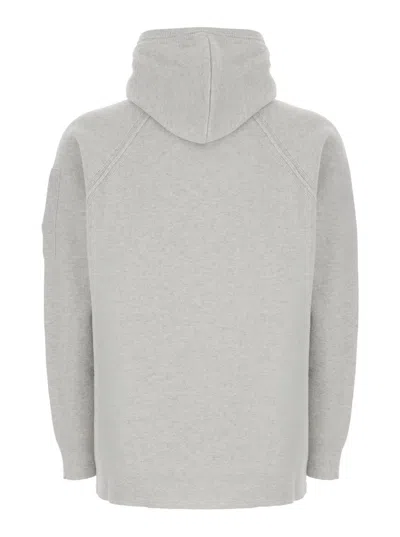 C.p. Company Grey Cardigan With Drawstring Hood And Logo Plaque On The Sleeve In Wool Blend Man In Gray