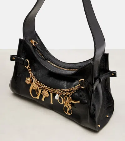 Chloé Logo Charm Hobo Bag In Shiny Leather In Black