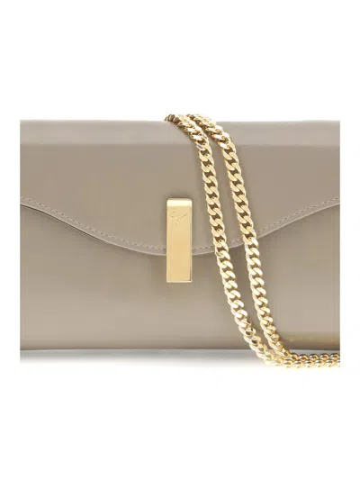 Giuseppe Zanotti Clutches In Sand
