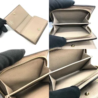 Pre-owned Louis Vuitton Beige Monogram Empreinte Wallet (bi-fold) () In Sand