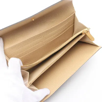 Pre-owned Louis Vuitton Brown Coated Canvas Long Wallet (bi-fold) ()