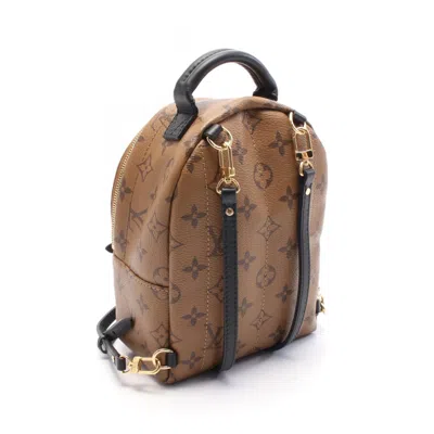 Pre-owned Louis Vuitton Brown Coated Canvas Pvc Monogram Reverse Leather Backpack ()