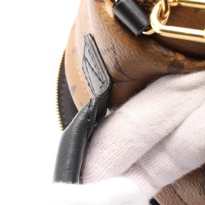 Pre-owned Louis Vuitton Brown Coated Canvas Pvc Monogram Reverse Leather Backpack ()