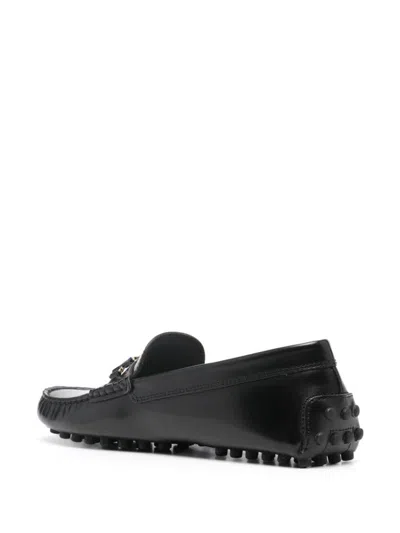 Tod's Loafers With Metallic Hardware And Rubber Sole In Black