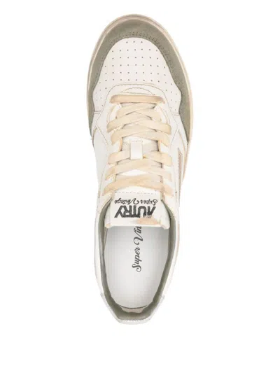 Autry Low Top Sneakers With Contrasting Leather Inserts In Neutral