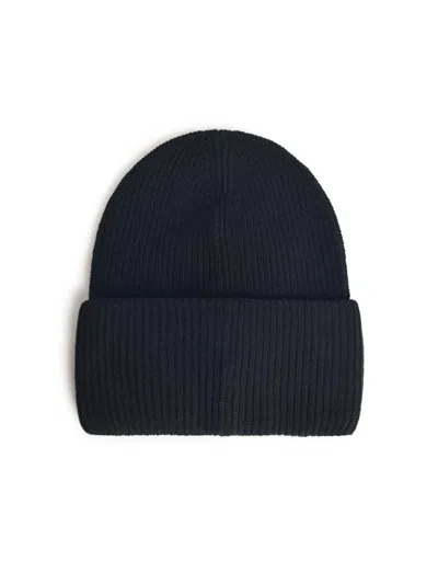 Moncler Ribbed Knit Carded Wool Beanie With Felt Logo Patch In Black