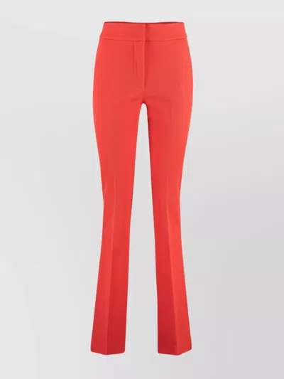 Genny Flared Trousers With High Waist And Seam Detailing In Red
