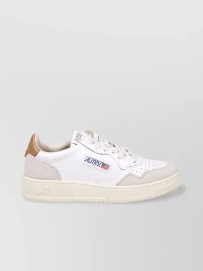 Autry Low Sneaker With Rubber Sole And Perforated Detailing