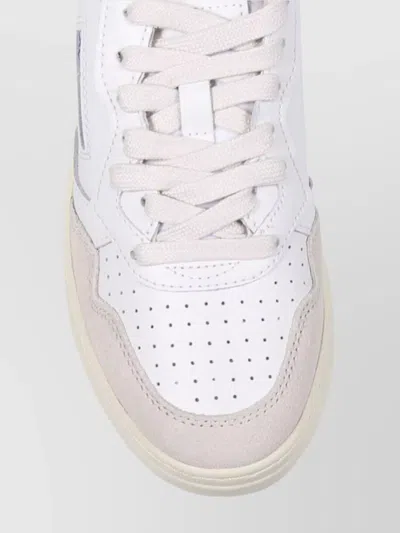 Autry Low Sneaker With Rubber Sole And Perforated Detailing