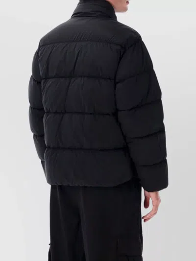 C.p. Company Quilted Down Jacket With High Collar And Logo Patch In Black