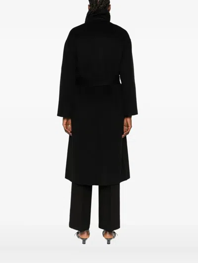 The Dynamis Studio Belted Wool Single-breasted Coat In Black