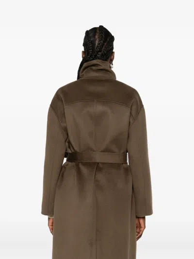 The Dynamis Studio Belted Single-breasted Coat In Brown