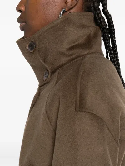 The Dynamis Studio Belted Single-breasted Coat In Brown