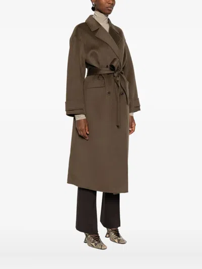 The Dynamis Studio Belted Single-breasted Coat In Brown