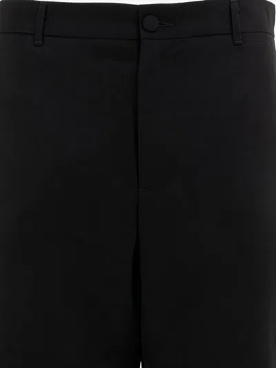 Gr10k Tailored Trousers With Pockets And Loops In Black