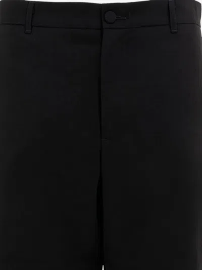 Gr10k Tailored Trousers With Pockets And Loops In Black