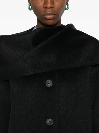 The Dynamis Studio Button-fastening Wool Jacket In Black