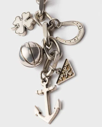 Prada Keychain With Assorted Charms And Symbols In Metallic