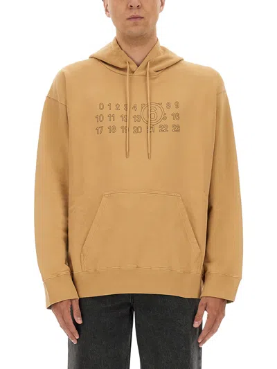 Mm6 Maison Margiela Mm6 By Maison Margiela Relaxed-fit Cotton Hoodie With Unique Graphic Print In Brown