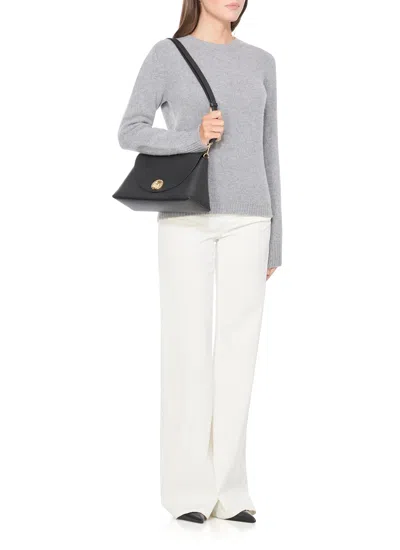 Coccinelle Black Foldover Top Handbag With Clasp Fastening And Zip Pocket In Black