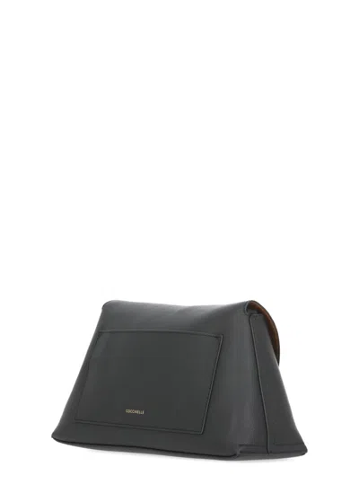 Coccinelle Black Foldover Top Handbag With Clasp Fastening And Zip Pocket In Black