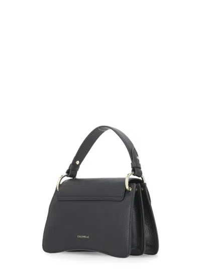 Coccinelle Structured Cowhide Leather Handbag With Adjustable Strap In Black