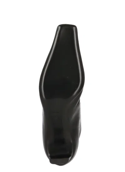 Khaite High-shaft Leather Boots With Glossy Finish In Black