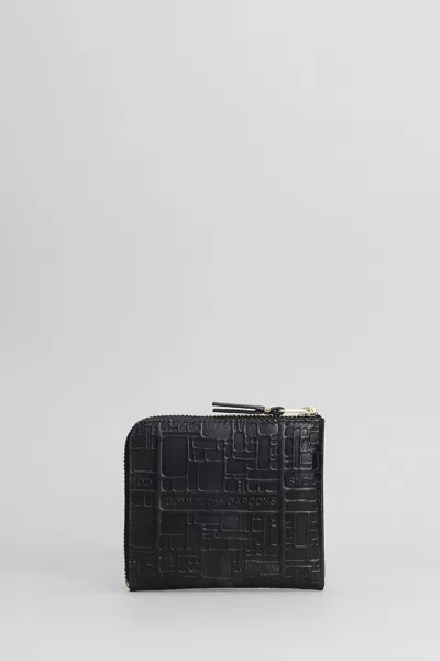 Comme Des Garçons Embossed Logotype Wallet In Black