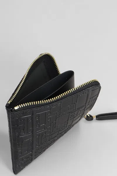 Comme Des Garçons Embossed Logotype Wallet In Black