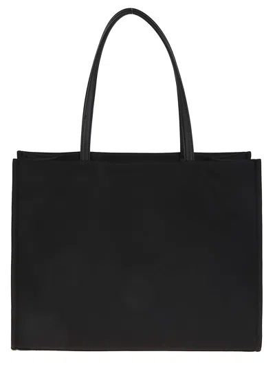 Tory Burch Spacious Black Tote With Embossed Logo And Sturdy Handles In Black