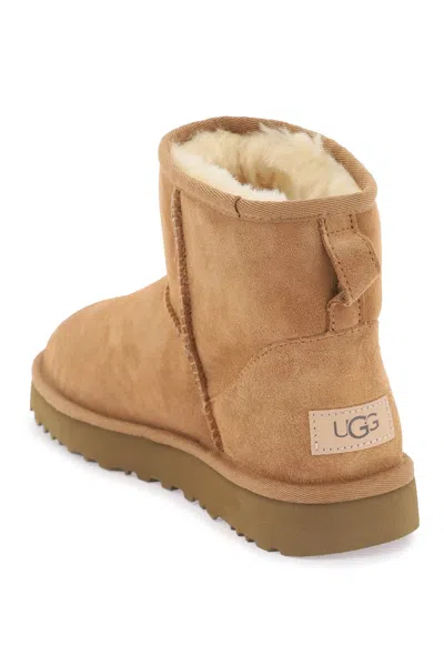Ugg 10mm Mini Classic Ii Shearling Boots In Brown