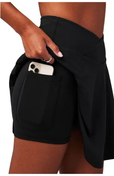 Fabletics Crossover Flounce Skirt In Black