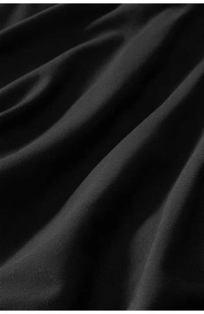 Fabletics Crossover Flounce Skirt In Black