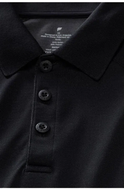 Fabletics The Training Day Polo In Black
