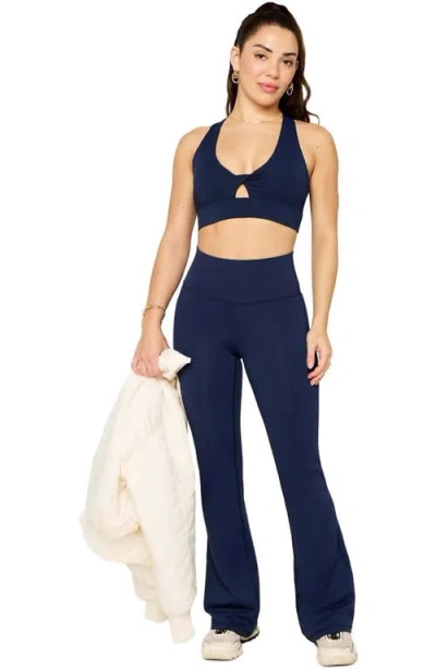 Fabletics Oasis Twist Medium Impact Sports Bra In Blue