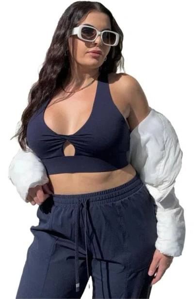 Fabletics Oasis Twist Medium Impact Sports Bra In Blue