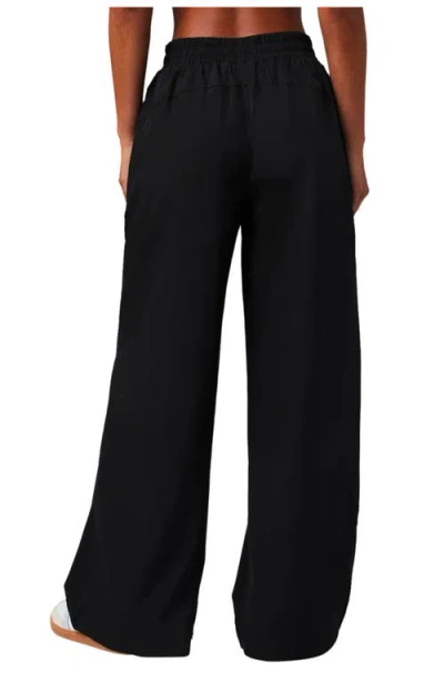 Fabletics Year Round Terry Wide Leg Sweatpant In Black