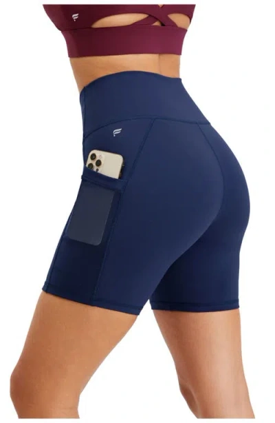 Fabletics On-the-go Powerhold® High-waisted 6'' Short In Blue