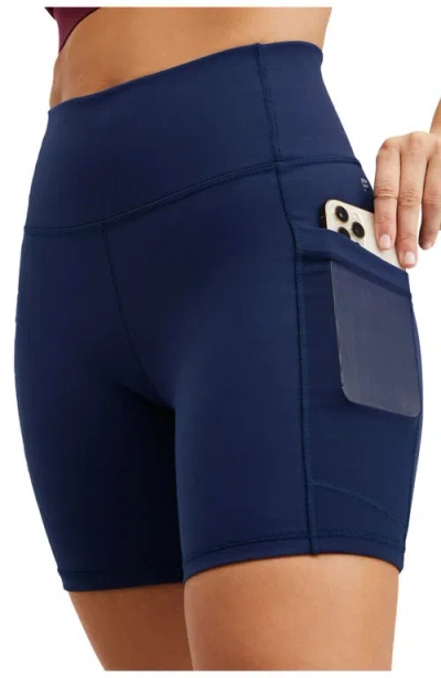 Fabletics On-the-go Powerhold® High-waisted 6'' Short In Blue