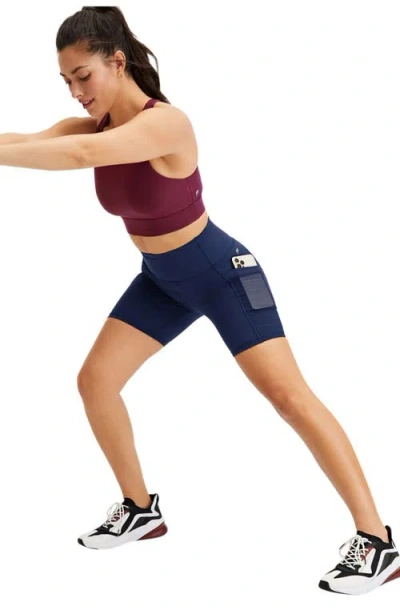 Fabletics On-the-go Powerhold® High-waisted 6'' Short In Blue