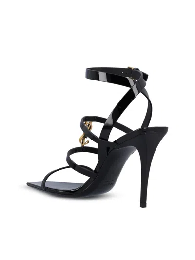 Saint Laurent Cassandra Ysl Medallion Leather Stiletto Sandals In Black