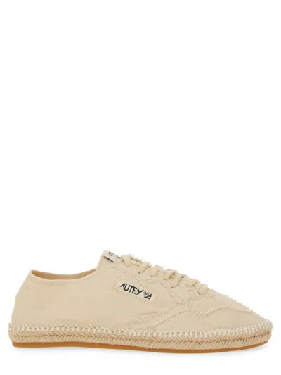 Autry Minimalist Flat Shoes With Textured Upper In Neutral