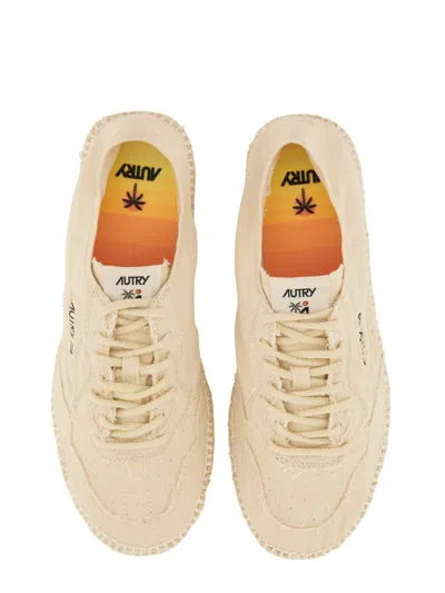 Autry Minimalist Flat Shoes With Textured Upper In Neutral