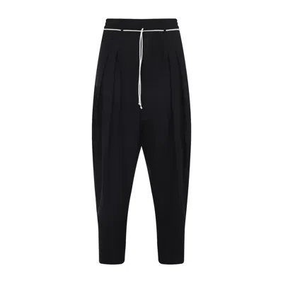 Mordecai Tapered Black Trousers With Pleated Front In Black