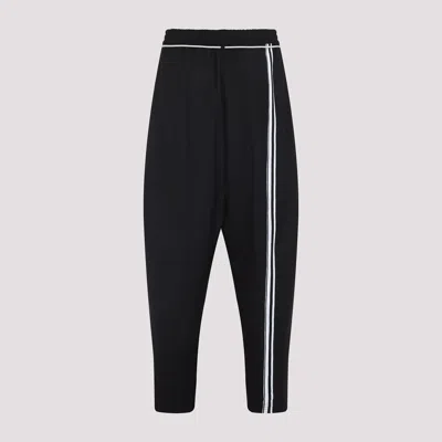Mordecai Tapered Black Trousers With Pleated Front In Black