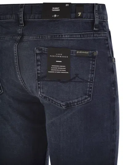 7 For All Mankind Slimmy Tapered Skinny Medium Waisted Jeans In Blue