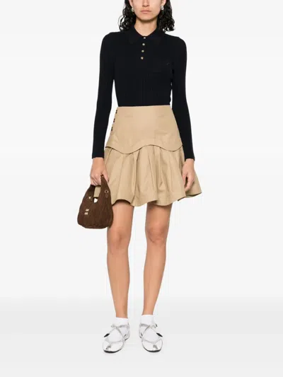 Sandro Poloshirt Aus Geripptem Strick In Blue